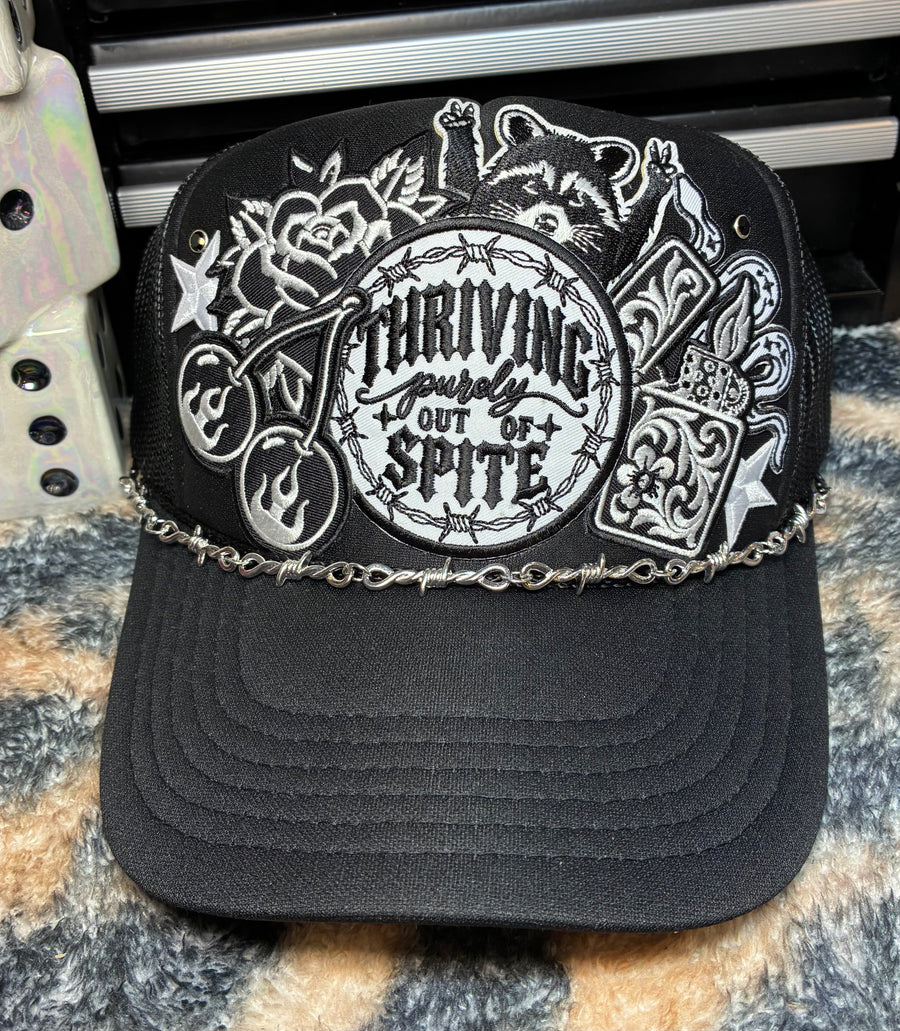 THRIVING OUT OF SPITE