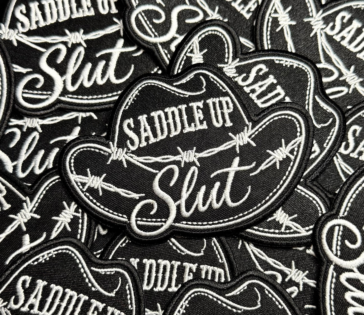 SADDLE UP