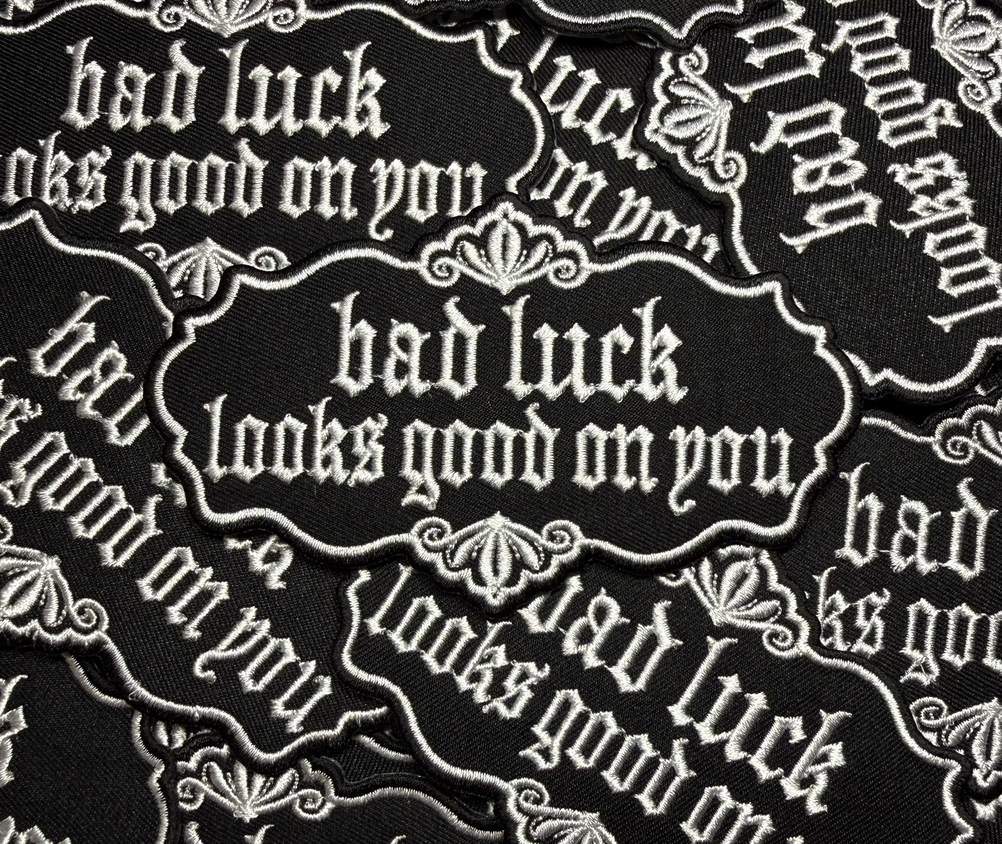 BAD LUCK LOOKS GOOD ON YOU